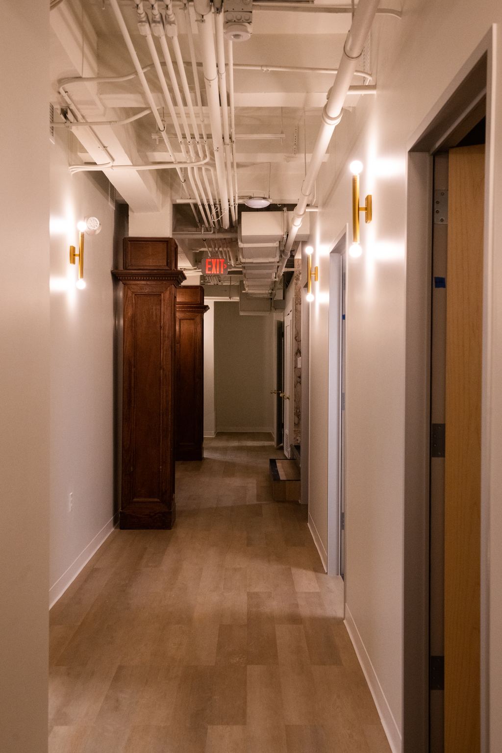 Corridor with original wood casings and new finishes