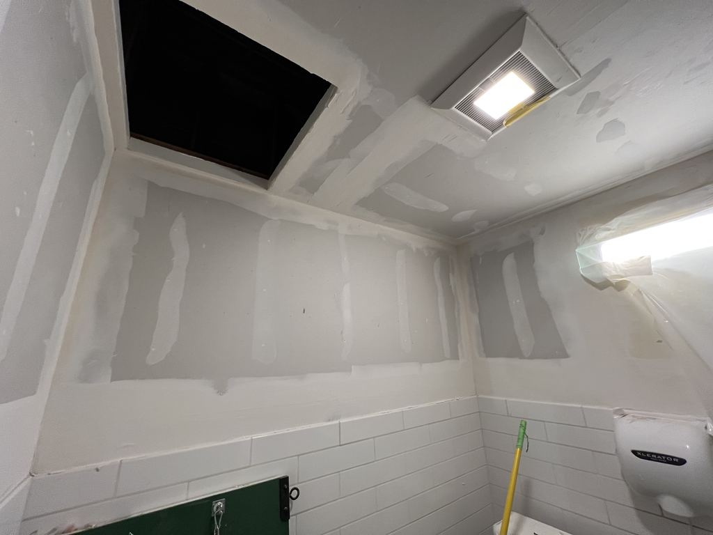 During: new drywall walls and ceiling in the restroom