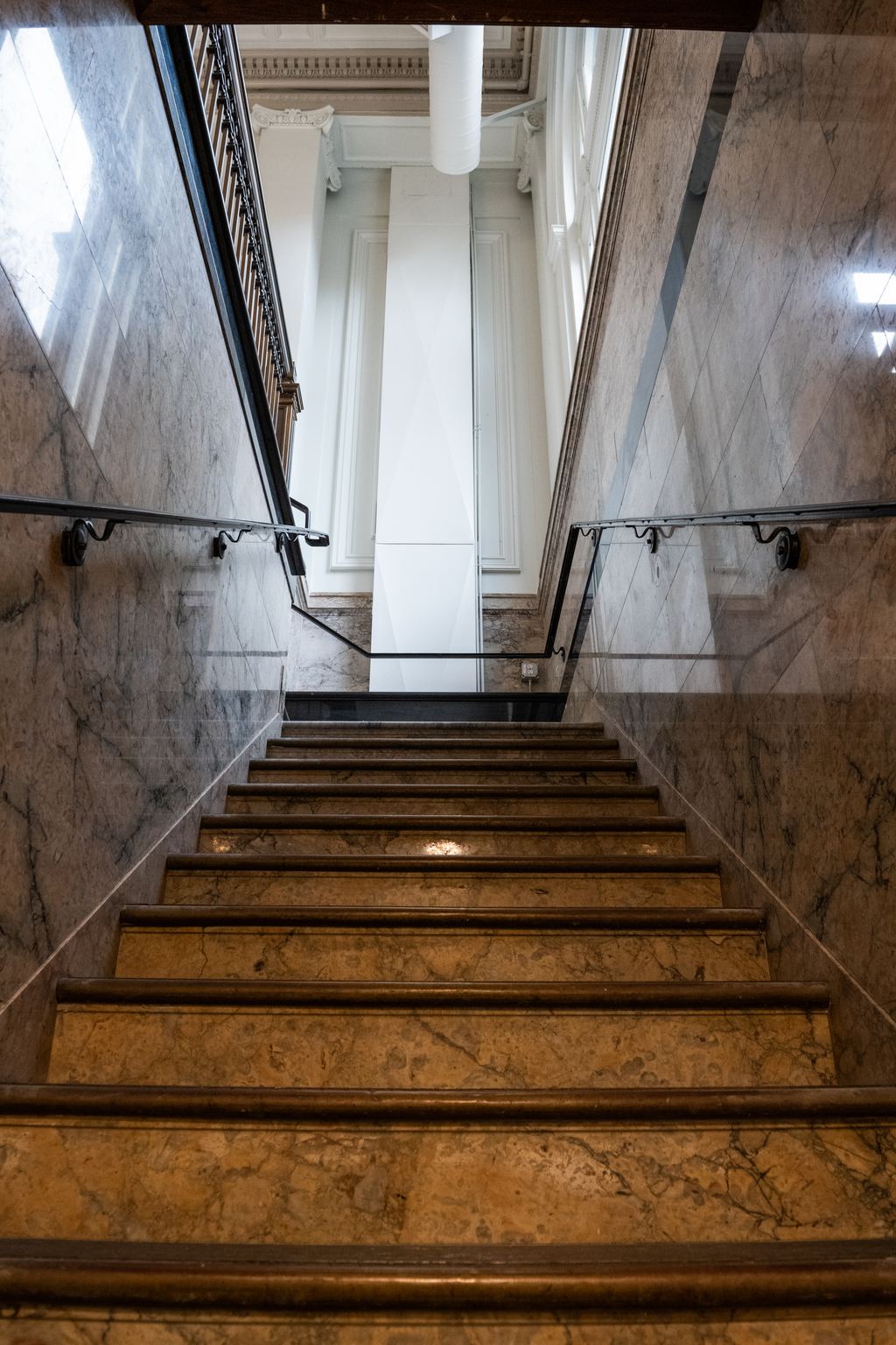 Original marble stair with bronze handrails, former bank, Clement St